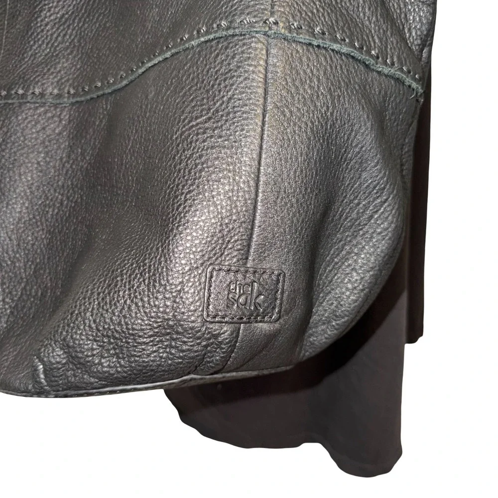 The Sak Indio black leather hobo bag, braided shoulder straps